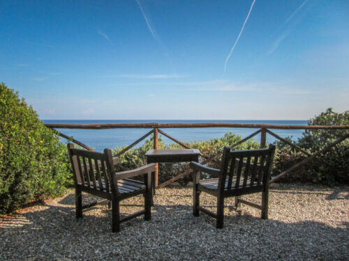 Il Pellicano chairs with view