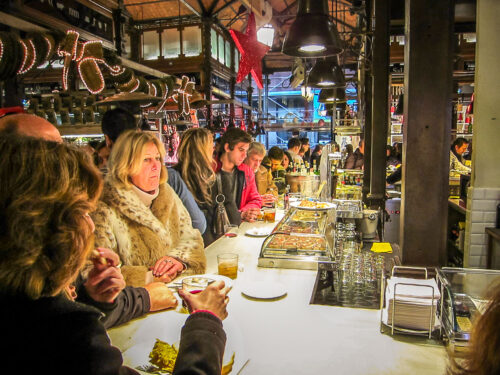 eating tapas at Mercado de San Miguel