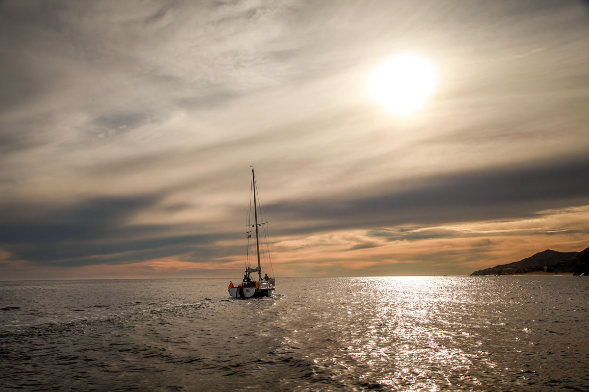 sailboat at sunset Los Cabos