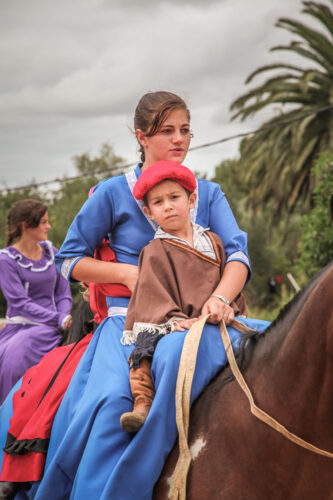Garzón gaucho parade mother and baby