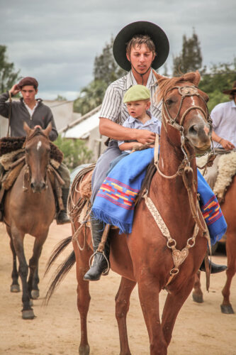Garzón gaucho parade father and son