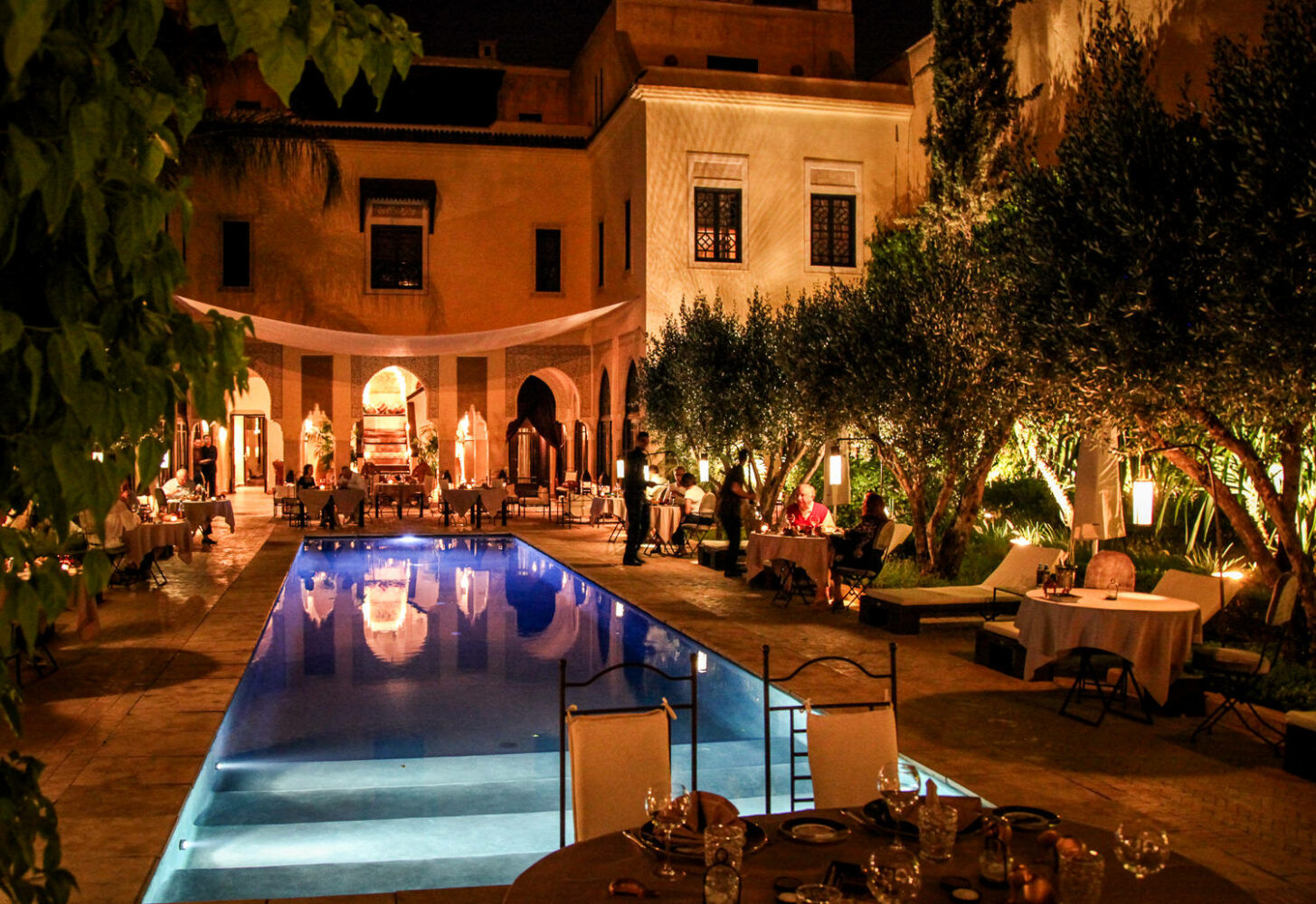 Villa des Orangers dining around pool night