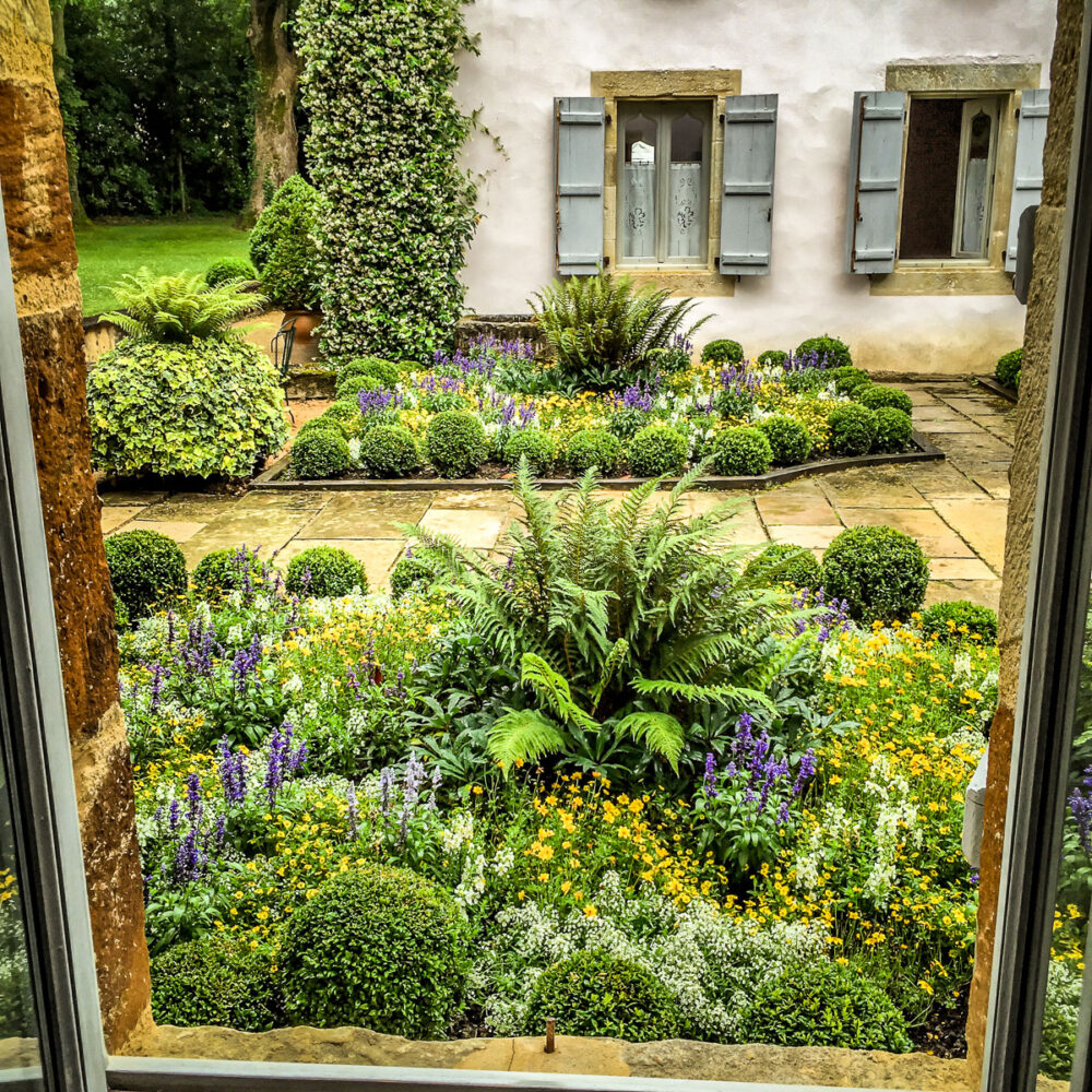 flowers outside room Les Prés d'Eugénie