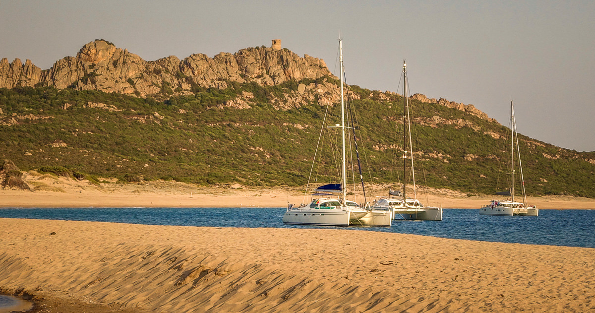 sailboats in bay Domaine de Murtoli
