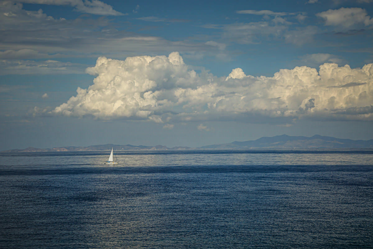 Folegandros sailboat clouds