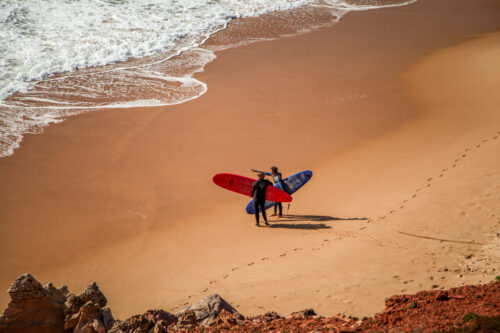 Praia do Amado surfers