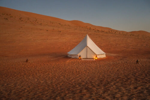 Canvas Club Private Tent Camp Wahiba Sands tent at dusk