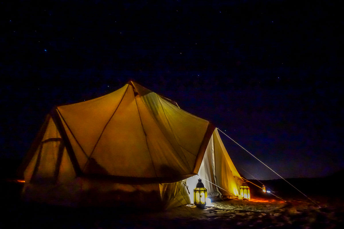 Canvas Club Oman tent at night