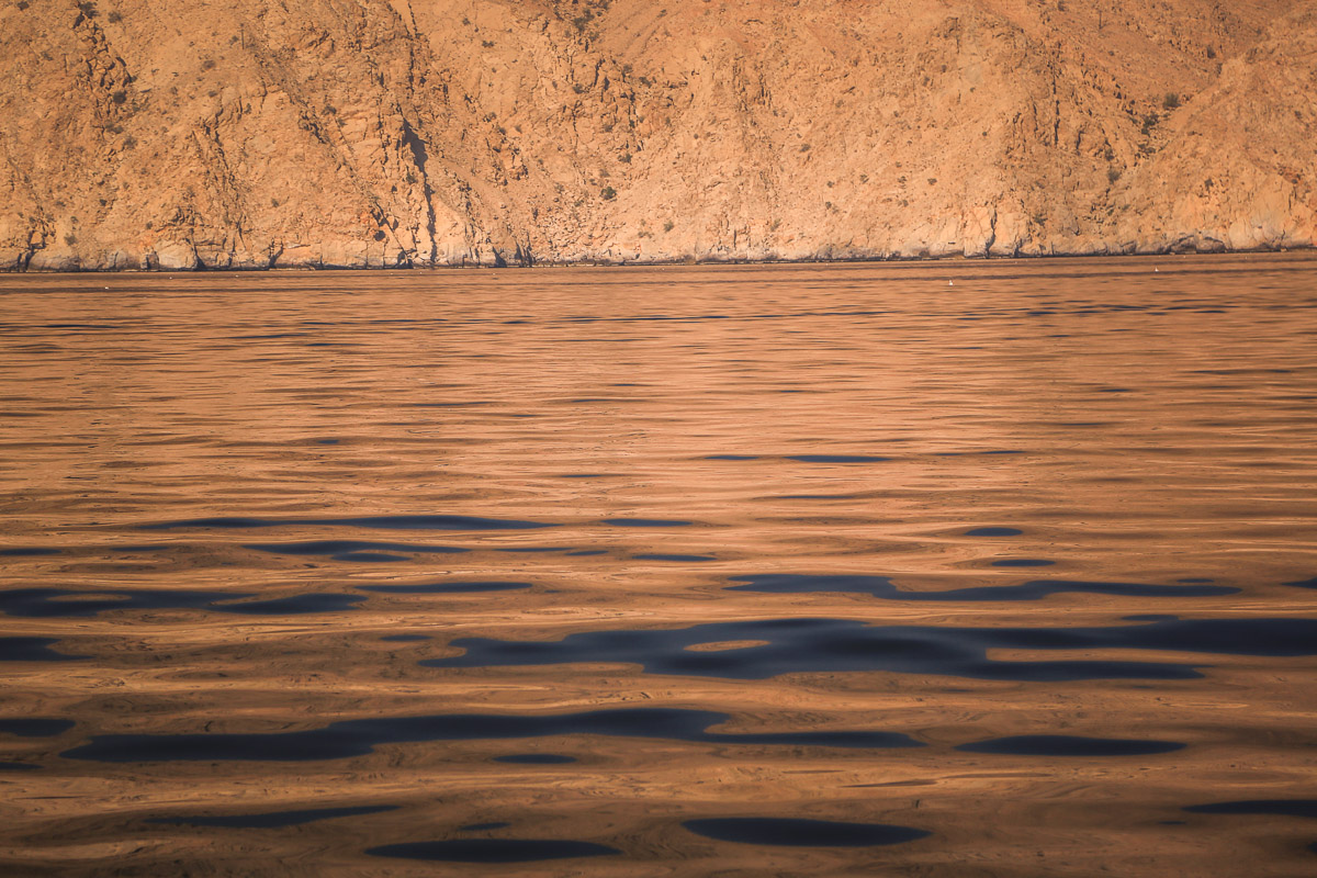 Six Senses Zighy Bay reflections on water