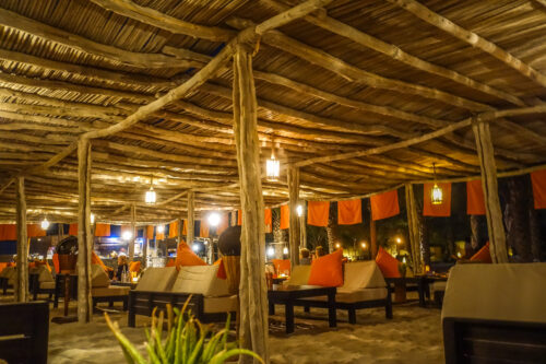 Six Senses Zighy Bay beach restaurant at night