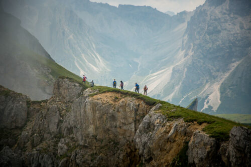 hikers on ridgeline Seceda