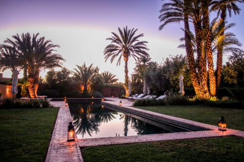 swimming ool at dusk Dar Ahlam