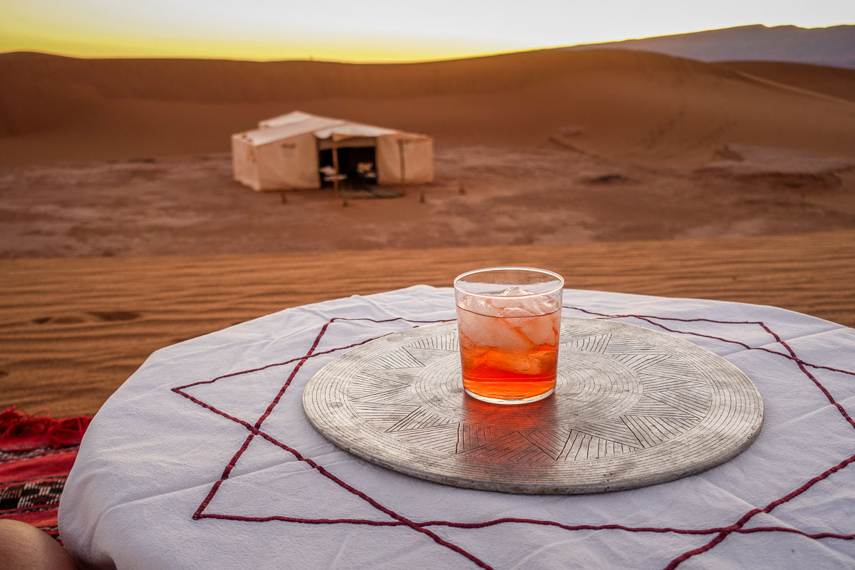 Dar Ahlam tent camp sunset negroni