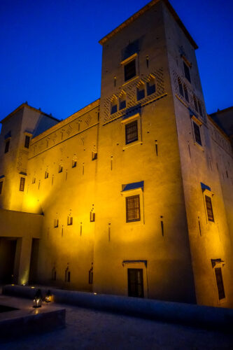 Dar Ahlam tower at night