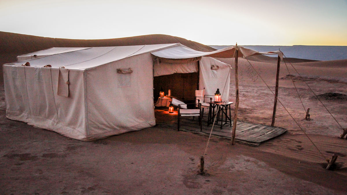 Dar Ahlam camp tent at dusk