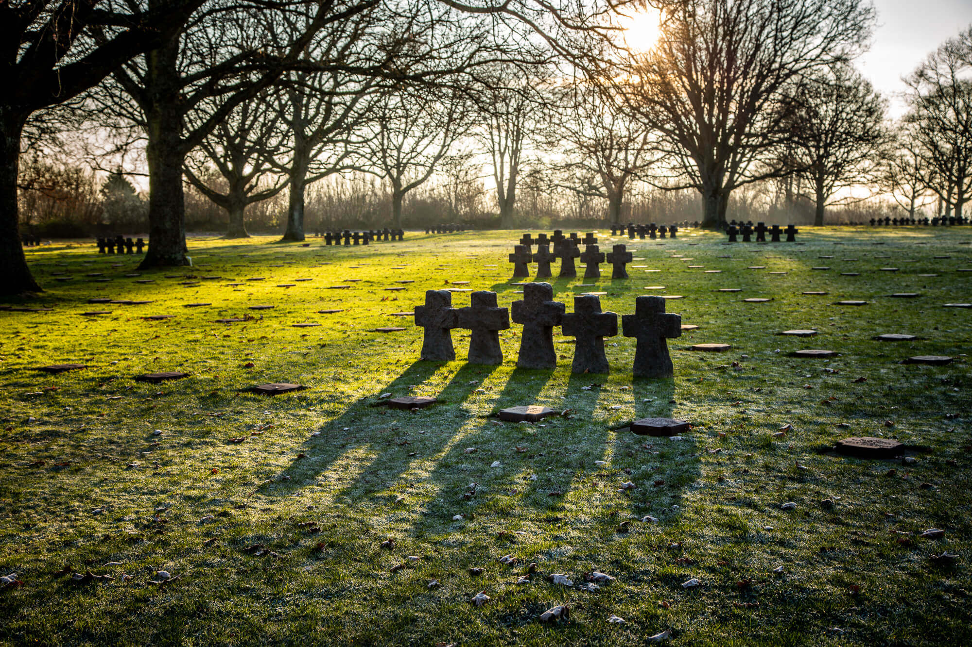 German Cemetery Normandy sunrise crosses winter