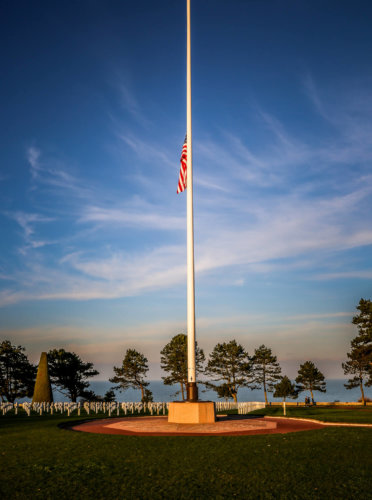 Normandy American Cemetery sunset flag lowering