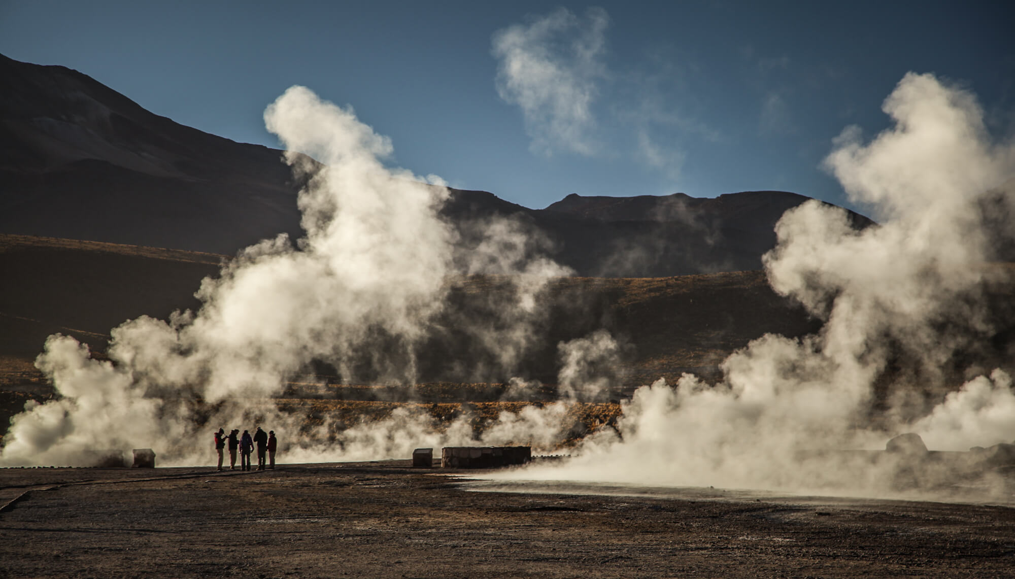 steaming geysers in morning El Tatio
