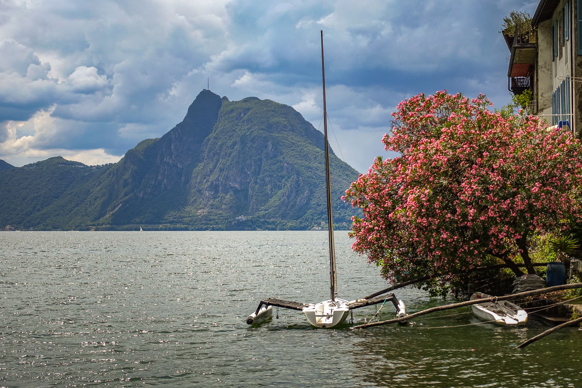 sailboat below Gandria Switzerland