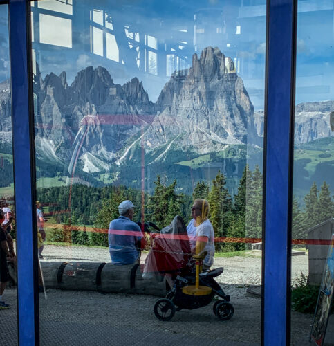 reflection of sassolungo cablecar