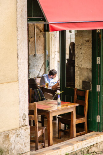 man in cafe Lisbon